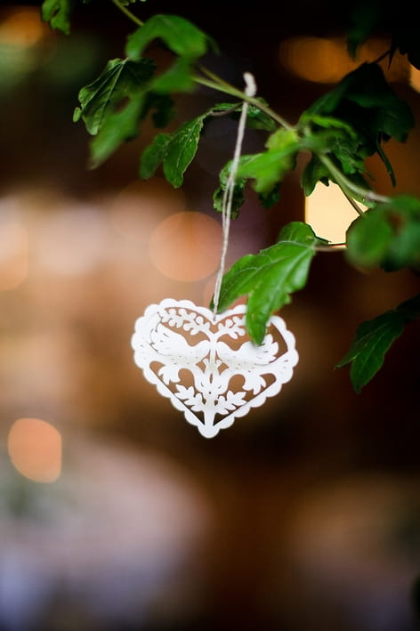 Small heart hanging on tree - A Beautiful Garden Party Wedding at Lains Barn