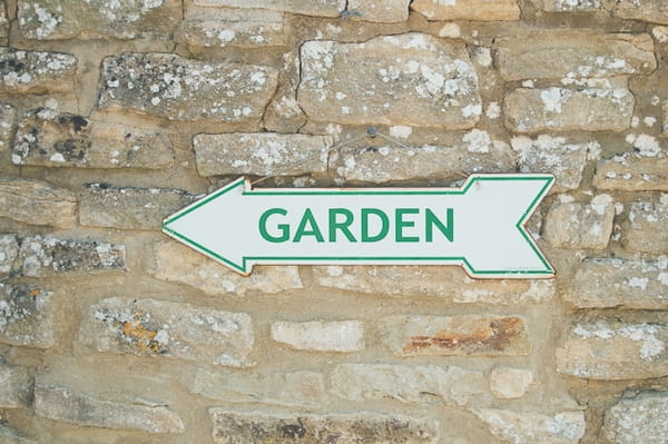 Garden arrow sign - A Farm Wedding with a British Summer Theme