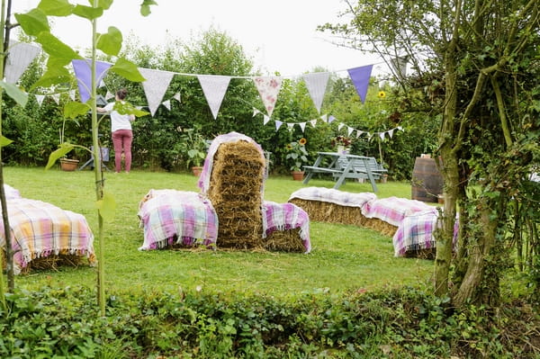 Hay bales in garden for country wedding