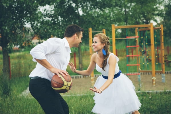 Bride and groom playing basketball - A Spring Themed Wedding in Hungary