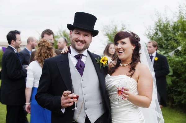 Bride and groom with top hat