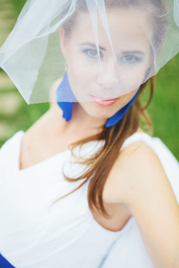 Bride with veil over face - A Spring Themed Wedding in Hungary