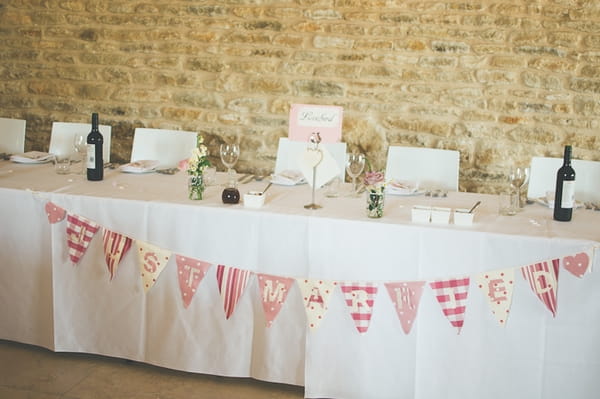 Wedding top table with bunting - A Farm Wedding with a British Summer Theme