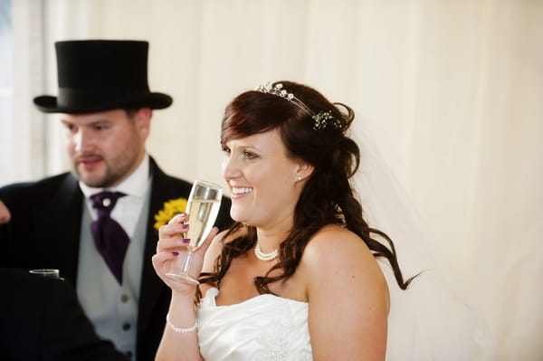 Bride sipping Champagne