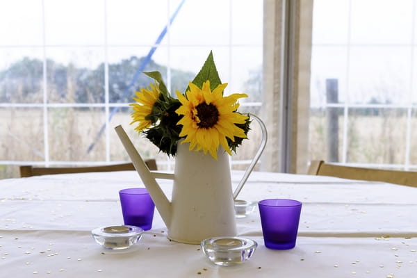 Wedding table centre - Sunflowers in watering can