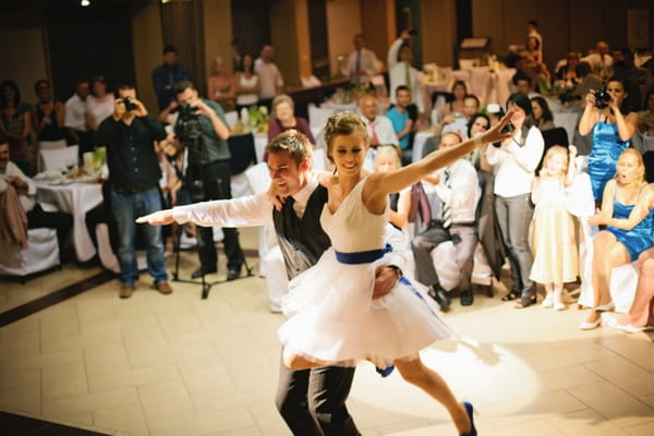 Groom spinning bride round - A Spring Themed Wedding in Hungary