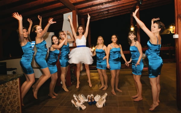 Bride and bridesmaids jumping - A Spring Themed Wedding in Hungary