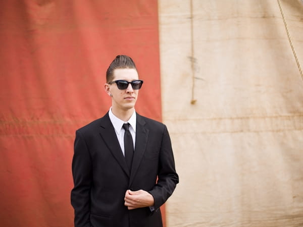 Groom wearing sunglasses