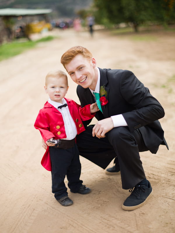 Small boy in circus master wedding outfit