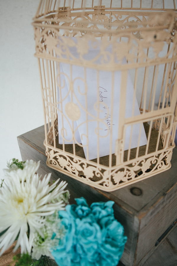 Birdcage with cards in