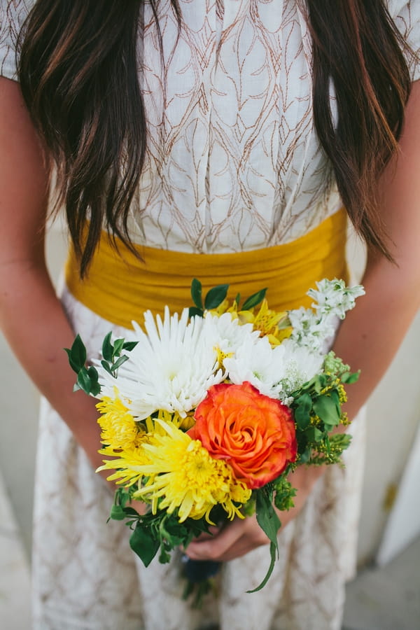 Bouquet of yellow, orange and white flowers