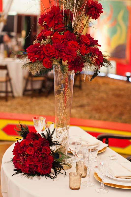 Wedding table with red flowers