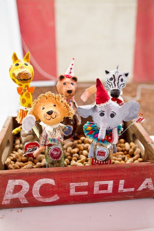 Bottles with circus animal toppers