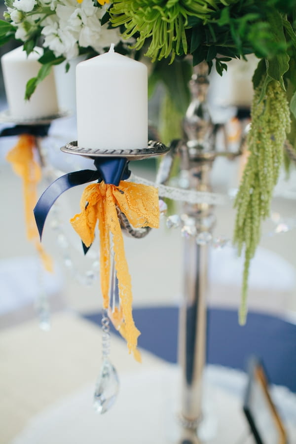 Candle centrepiece on wedding table