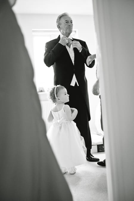 Father of bride adjusting tie - Picture by Karli Harrison Photography
