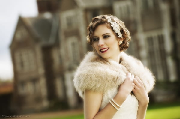 1920's bride with shrug outside Loseley Park