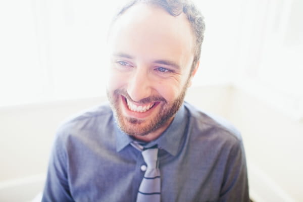 Groom smiling