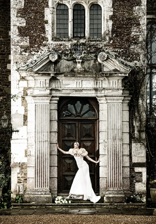 1920's bride in doorway of Loseley Park