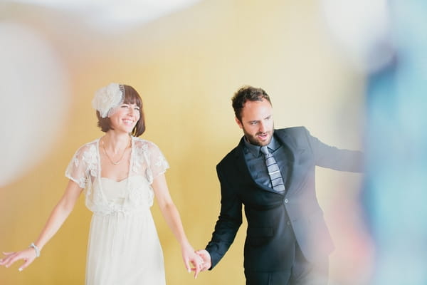 Bride and groom doing dance move