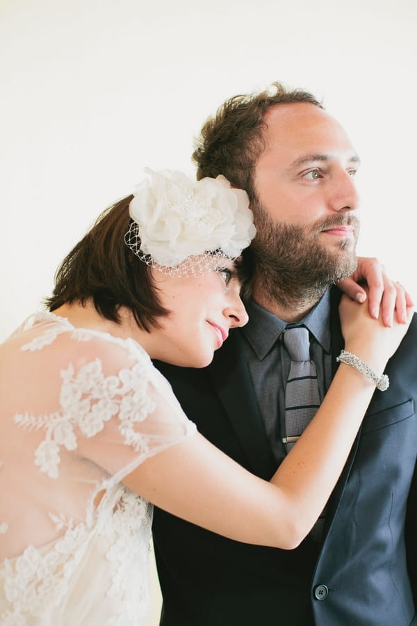 Bride resting head on groom