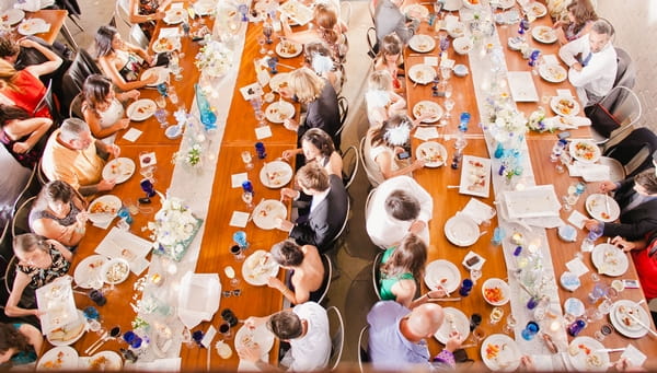 Wedding guests eating wedding breakfast