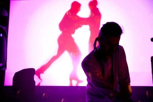 Wedding dj with silhouette in background