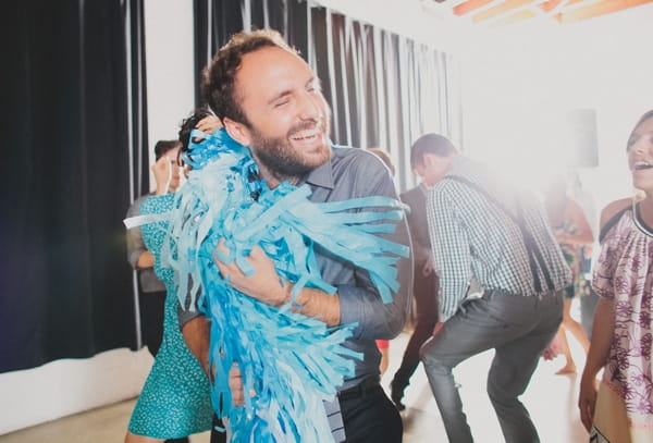 Groom with blue pom pom