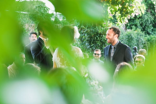 Wedding ceremony through leaves