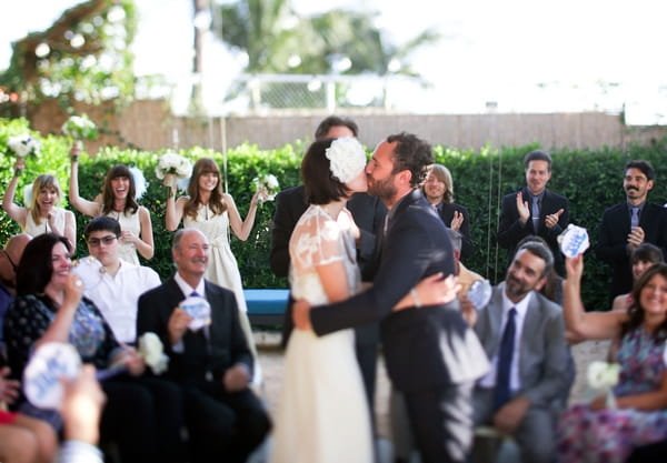 Bride and groom kiss