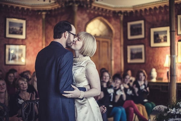 Bride and groom kiss after ceremony