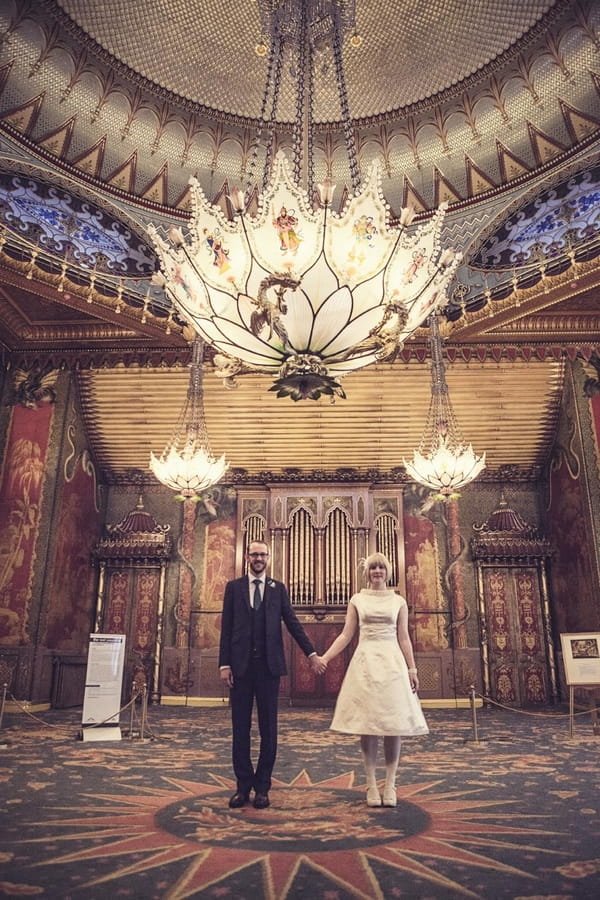 Bride and groom in The Pavilion, Brighton