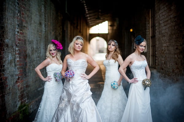 Brides standing by alley way