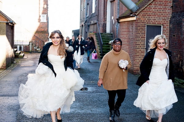 Brides walking to photo shoot