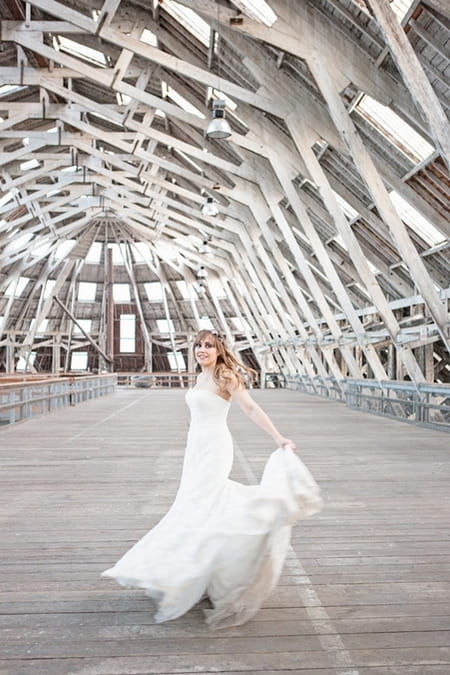 Bride lifting train to twirl