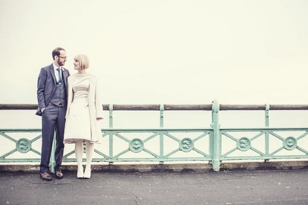 Bride and groom on Brighton pier