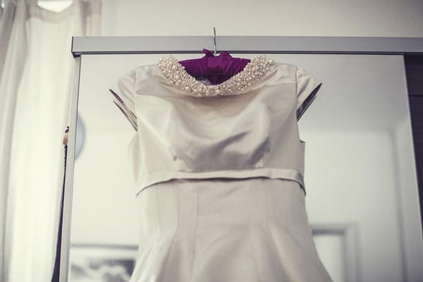 Wedding dress with pearl neckline