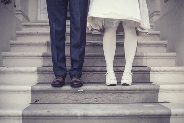 Bride and groom's legs