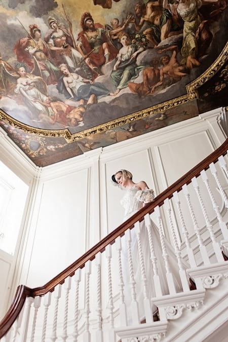 Bride walking down stairs