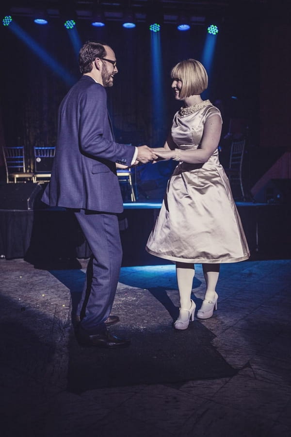 Bride and groom dancing