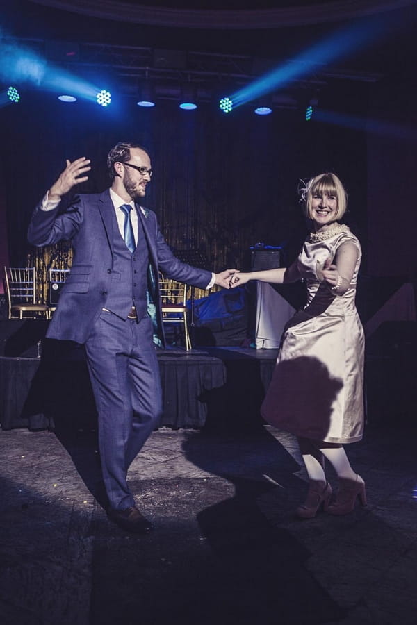 Bride and groom dancing