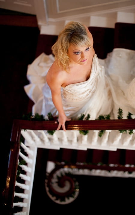 Bride standing on stairs