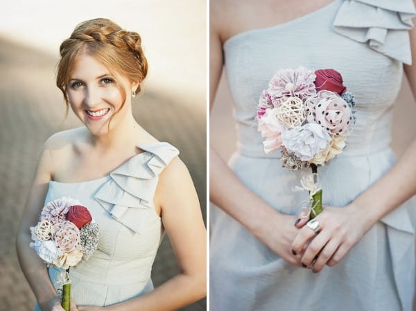 Bridesmaid in light blue dress holding bouquet