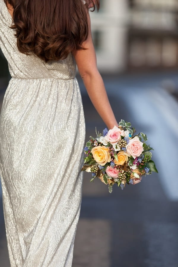 Bride carrying bouquet