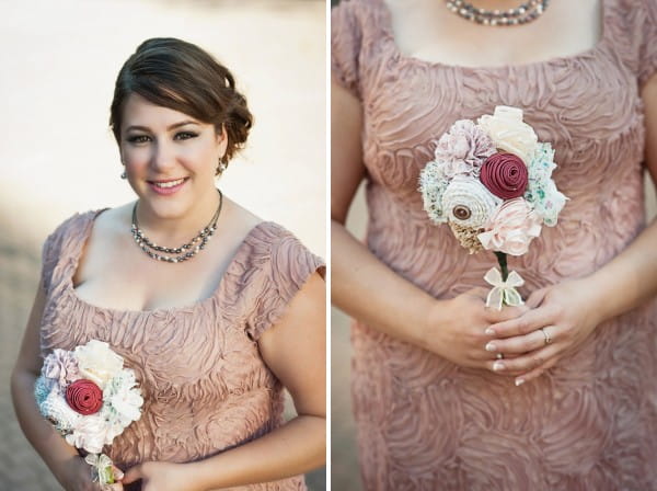 Bridesmaid in pink dress holding bouquet