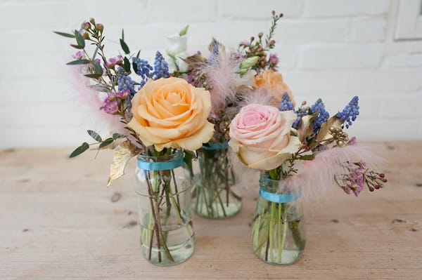 Jars of wedding flowers