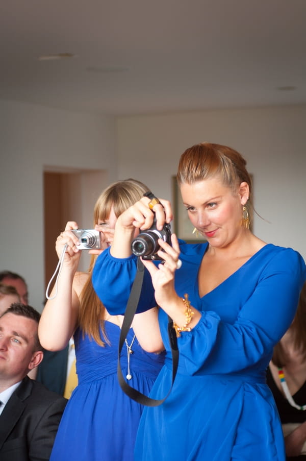 Bridesmaids taking pictures