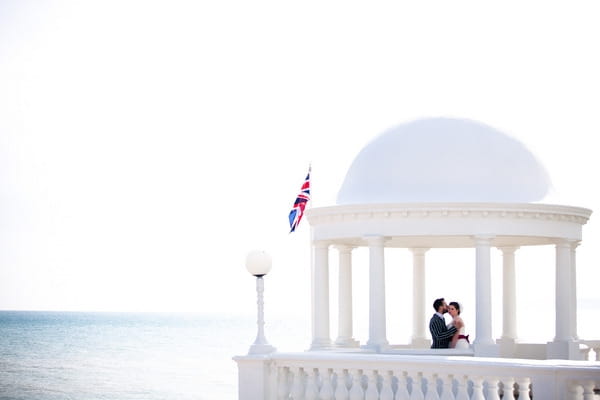 Bride and groom by sea