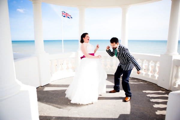 Bride and groom being silly