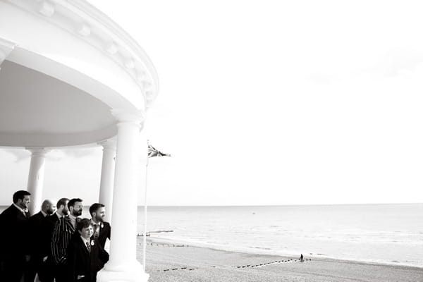 Groomsmen by beach