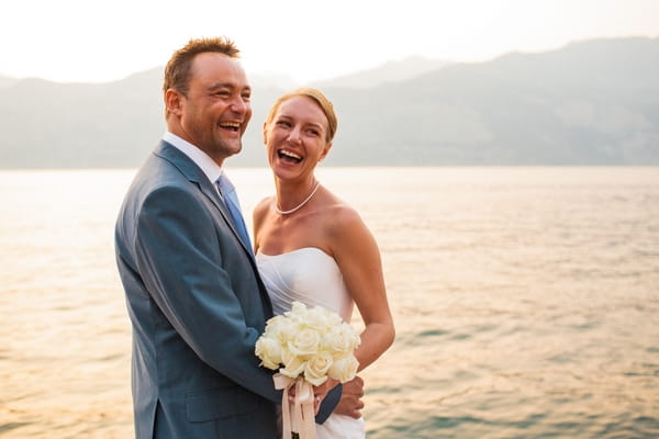 Bride and groom by sea